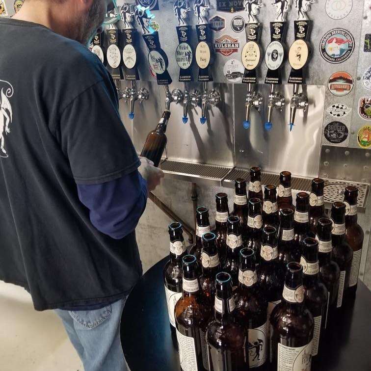 Working hard to keep those bottles filled. We do it all! Open today 2-6 for growler …